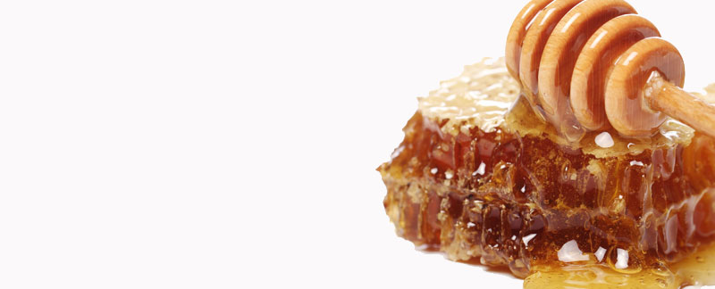 A close up of a piece of honey